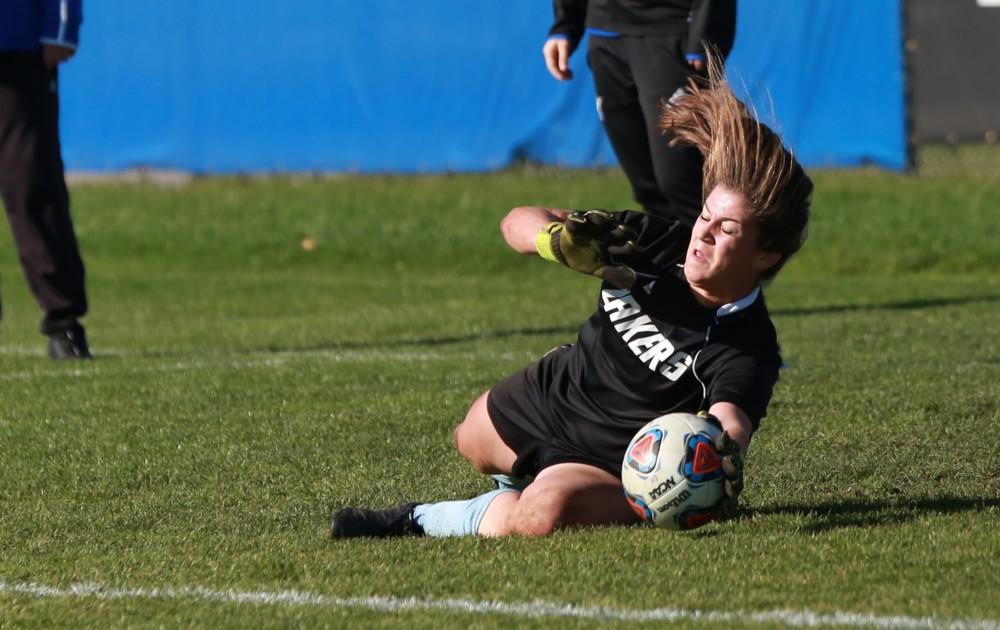 GVL / Kevin Sielaff - Goaltender Emily Maresh (0) warms up before the match.  Grand Valley squares off against Quincy in the second round of the women's soccer NCAA tournament Nov. 15 in Allendale. The Lakers take the victory with a final score of 6-0.