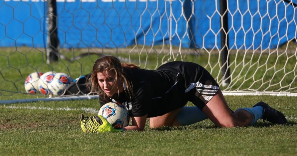 GVL / Kevin Sielaff - Goaltender Emily Maresh (0) warms up before the match.  Grand Valley squares off against Quincy in the second round of the women's soccer NCAA tournament Nov. 15 in Allendale. The Lakers take the victory with a final score of 6-0.