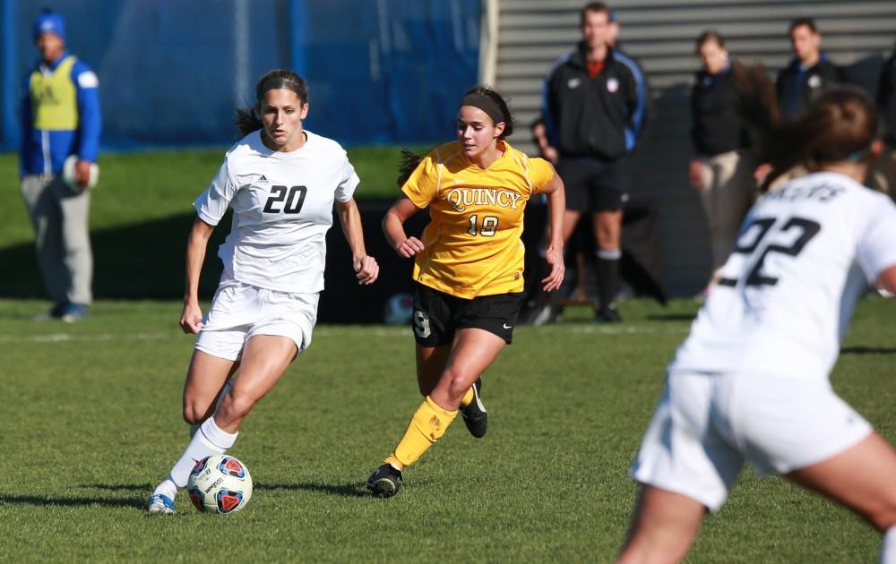 GVL / Kevin Sielaff - Gabriella Mencotti (20) drives toward Quincy's net.  Grand Valley squares off against Quincy in the second round of the women's soccer NCAA tournament Nov. 15 in Allendale. The Lakers take the victory with a final score of 6-0.