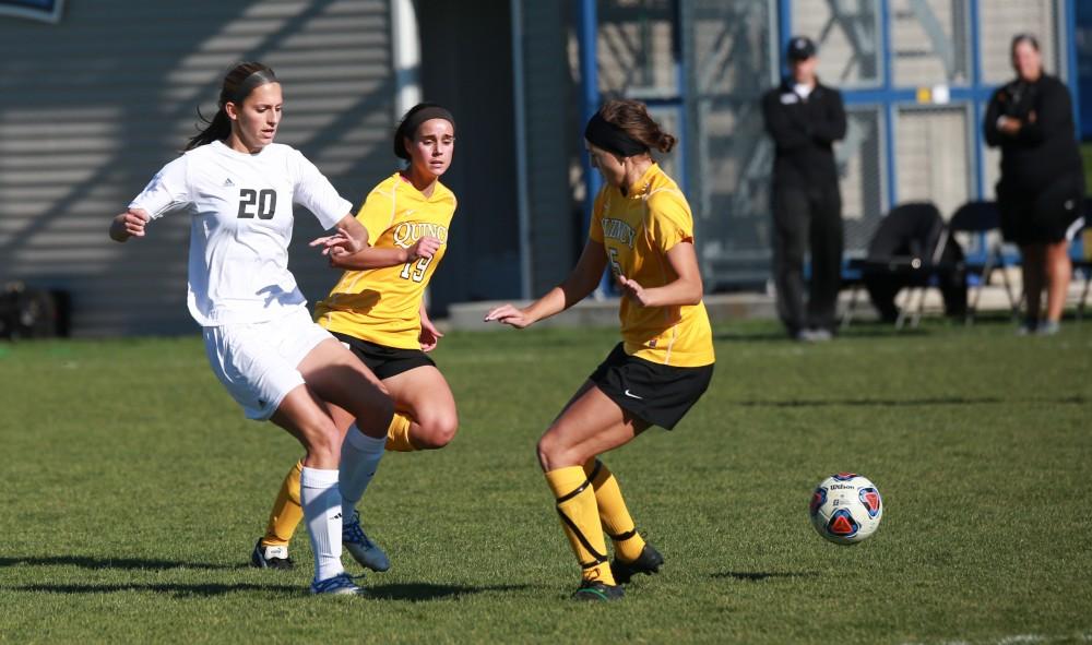 GVL / Kevin Sielaff - Gabriella Mencotti (20) tries a shot on goal.  Grand Valley squares off against Quincy in the second round of the women's soccer NCAA tournament Nov. 15 in Allendale. The Lakers take the victory with a final score of 6-0.