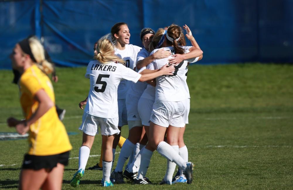 GVL / Kevin Sielaff - The Lakers celebrate a goal.  Grand Valley squares off against Quincy in the second round of the women's soccer NCAA tournament Nov. 15 in Allendale. The Lakers take the victory with a final score of 6-0.