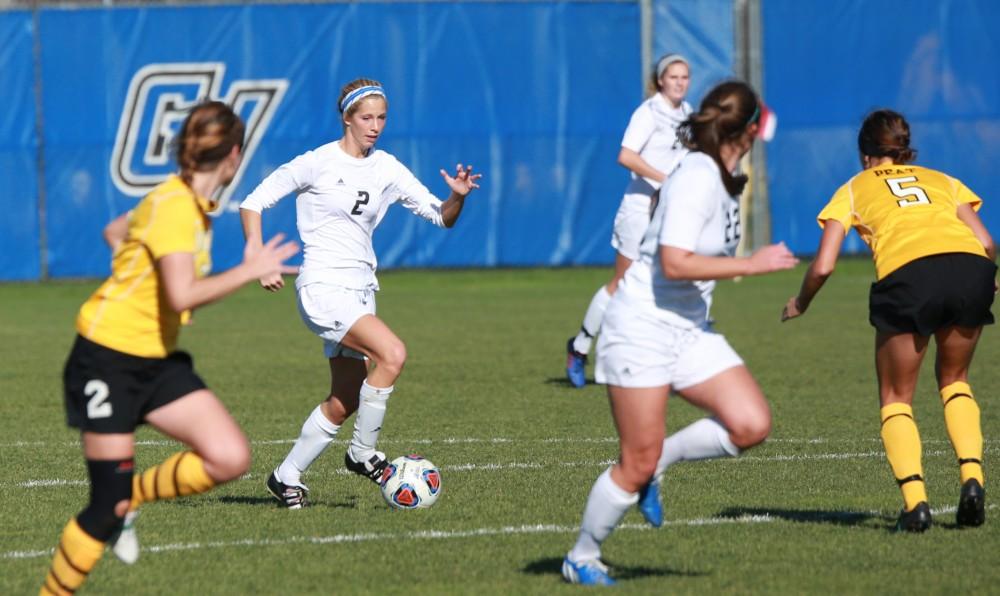 GVL / Kevin Sielaff - Katie Klunder (2) moves the ball up field.  Grand Valley squares off against Quincy in the second round of the women's soccer NCAA tournament Nov. 15 in Allendale. The Lakers take the victory with a final score of 6-0.