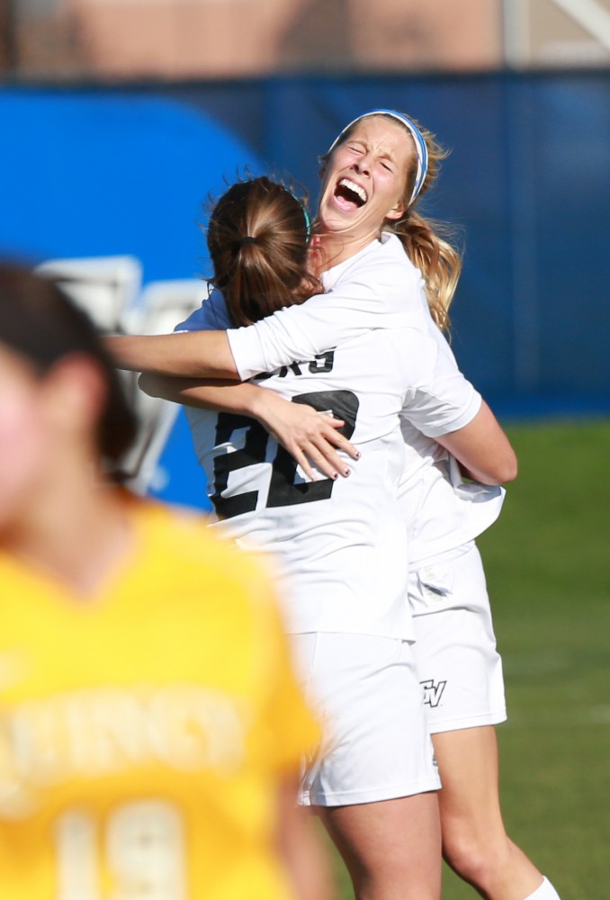 GVL / Kevin Sielaff - Katie Klunder (2) and Samantha Riga (22) celebrate a goal.  Grand Valley squares off against Quincy in the second round of the womens soccer NCAA tournament Nov. 15 in Allendale. The Lakers take the victory with a final score of 6-0.