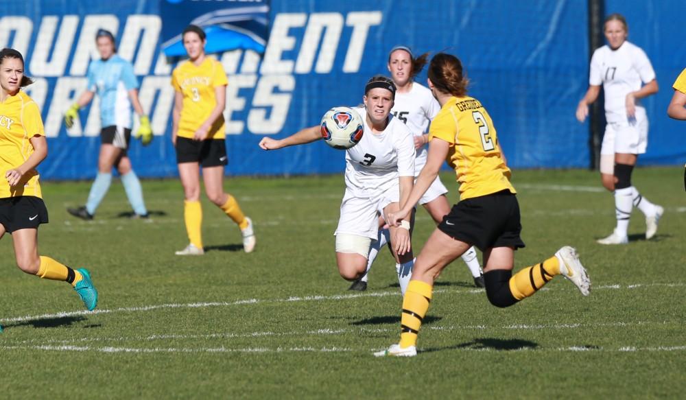 GVL / Kevin Sielaff - Gabbie Guibord (3) steps up to make a play on the ball.  Grand Valley squares off against Quincy in the second round of the women's soccer NCAA tournament Nov. 15 in Allendale. The Lakers take the victory with a final score of 6-0.