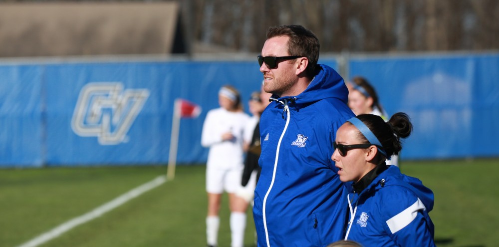 GVL / Kevin Sielaff - Jeff Hosler looks on toward the play.  Grand Valley squares off against Quincy in the second round of the women's soccer NCAA tournament Nov. 15 in Allendale. The Lakers take the victory with a final score of 6-0.