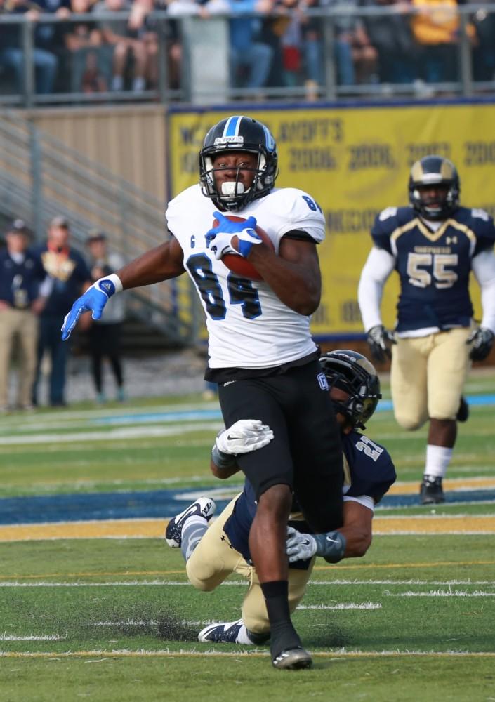 GVL / Kevin Sielaff - Urston Smith (84) receives a catch and looks to gain yardage. The Lakers fall to the Rams of Shepard University with a final score of 34-32 Dec. 12 in Shepardstown, West Virginia.