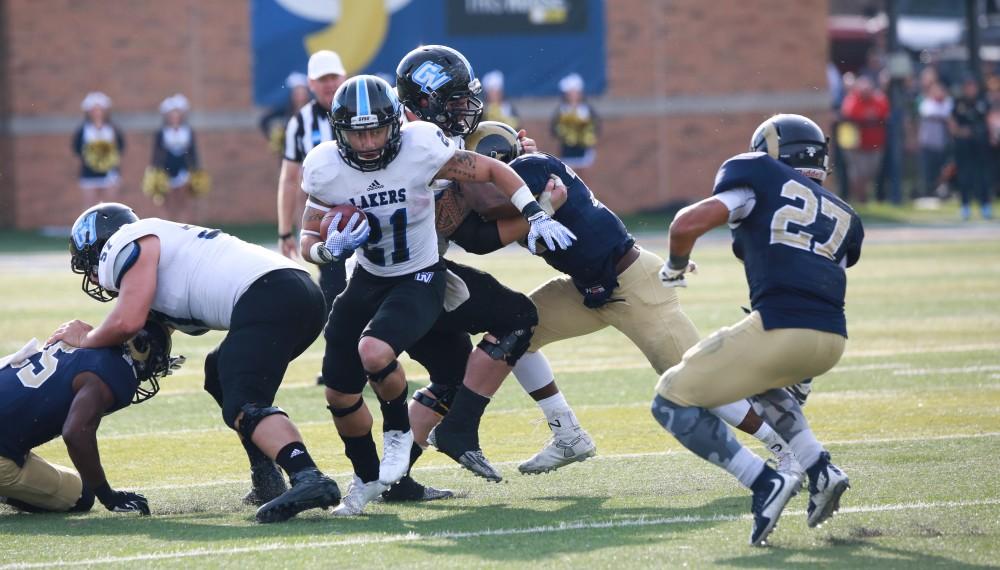 GVL / Kevin Sielaff -  Ben Hutchins (21) penetrates Shepard's defense on a punt return.  The Lakers fall to the Rams of Shepard University with a final score of 34-32 Dec. 12 in Shepardstown, West Virginia.