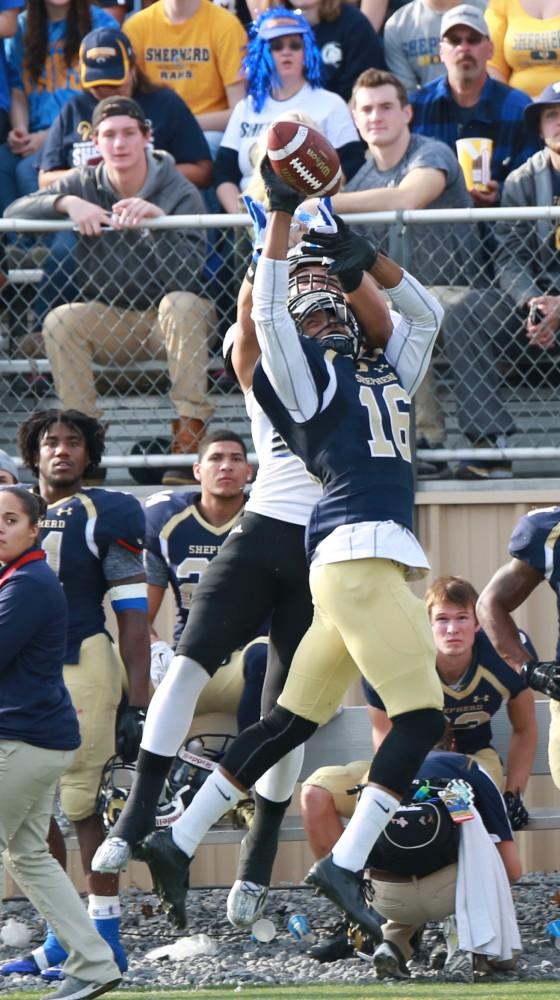 GVL / Kevin Sielaff - Matt Williams (24) reaches for a reception, but the ball is knocked away.  The Lakers fall to the Rams of Shepard University with a final score of 34-32 Dec. 12 in Shepardstown, West Virginia.