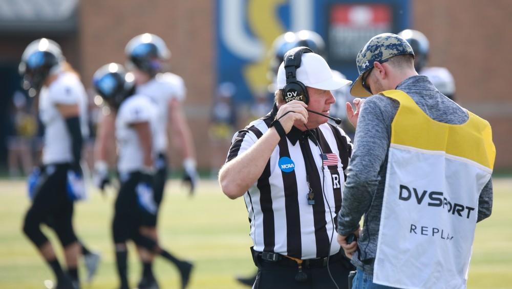 GVL / Kevin Sielaff - Officials review a play on the sideline.  The Lakers fall to the Rams of Shepard University with a final score of 34-32 Dec. 12 in Shepardstown, West Virginia.