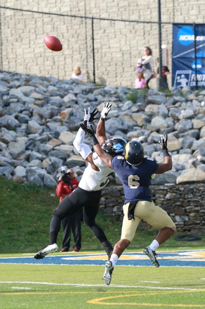 GVL / Kevin Sielaff - Brandon Bean (3) elevates to make a catch, but the ball is tipped away.  The Lakers fall to the Rams of Shepard University with a final score of 34-32 Dec. 12 in Shepardstown, West Virginia.