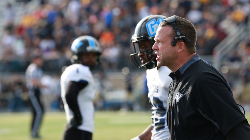 GVL / Kevin Sielaff - Head coach Matt Mitchell, upset by a play call, runs back to the Grand Valley bench.  The Lakers fall to the Rams of Shepard University with a final score of 34-32 Dec. 12 in Shepardstown, West Virginia.