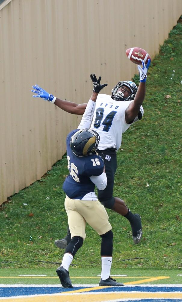 GVL / Kevin Sielaff - Urston Smith (84) elevates to try and make a catch, but the ball is tipped away.  The Lakers fall to the Rams of Shepard University with a final score of 34-32 Dec. 12 in Shepardstown, West Virginia.