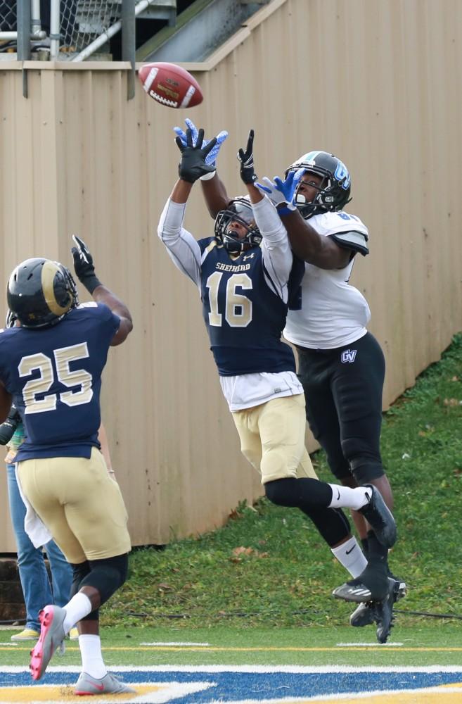 GVL / Kevin Sielaff - Urston Smith (84) leaps to make a catch, but the ball is deflected.  The Lakers fall to the Rams of Shepard University with a final score of 34-32 Dec. 12 in Shepardstown, West Virginia.