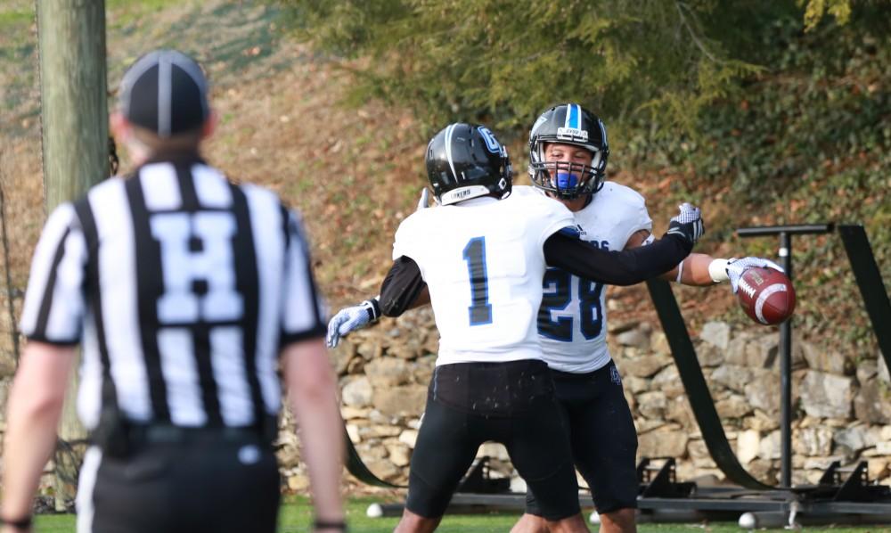 GVL / Kevin Sielaff - Tre Walton (28) returns a blocked kick to the end zone and celebrates.  The Lakers fall to the Rams of Shepard University with a final score of 34-32 Dec. 12 in Shepardstown, West Virginia.