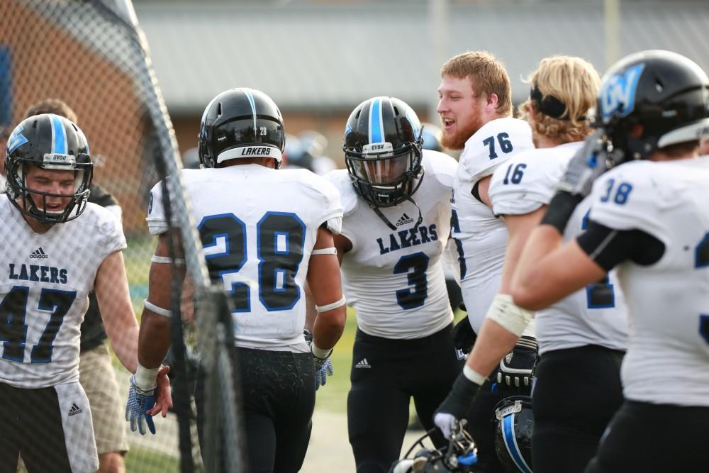 GVL / Kevin Sielaff - Brandon Bean (3) celebrates with Tre Walton (28) after his kick return.  The Lakers fall to the Rams of Shepard University with a final score of 34-32 Dec. 12 in Shepardstown, West Virginia.