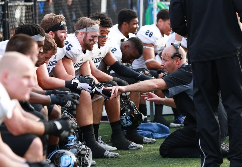 GVL / Kevin Sielaff - Jim Louis speaks to his line men as the game comes to a close.  The Lakers fall to the Rams of Shepard University with a final score of 34-32 Dec. 12 in Shepardstown, West Virginia.