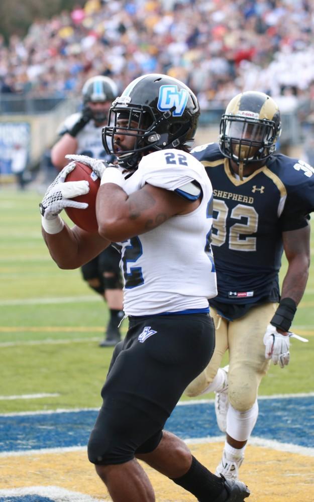 GVL / Kevin Sielaff - Terrell Dorsey (22) catches the ball in the end zone.  The Lakers fall to the Rams of Shepard University with a final score of 34-32 Dec. 12 in Shepardstown, West Virginia.