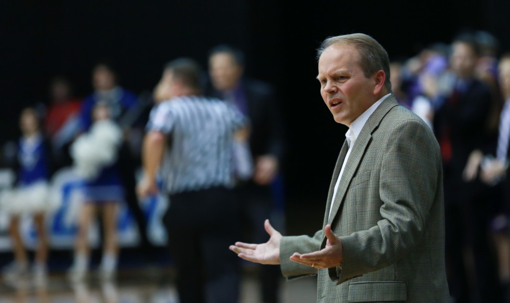 GVL / Kevin Sielaff - Head coach Ric Wesley looks on toward the play.  The Lakers fall to the Eagles of Ashland University in a tough overtime loss Dec. 3 in Allendale. The final score was 76-72.