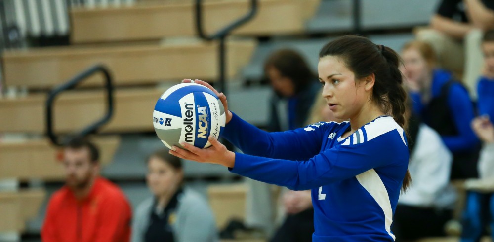 GVL / Kevin Sielaff - Taylor Shomin (2) prepares to serve the ball.  The Lakers fall to the Flyers of Lewis University Dec. 3 in Big Rapids, MI in the first round of the NCAA midwest regional tournament by a margin of 3-1.