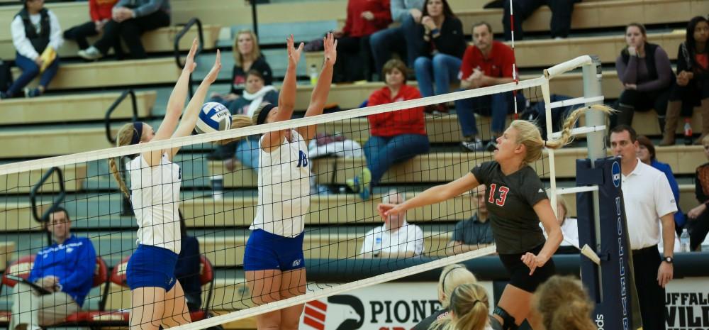 GVL / Kevin Sielaff - Kaleigh Lound (15) and Shannon Winicki (18) go up for a block, but the ball slips through the two.  The Lakers fall to the Flyers of Lewis University Dec. 3 in Big Rapids, MI in the first round of the NCAA midwest regional tournament by a margin of 3-1.