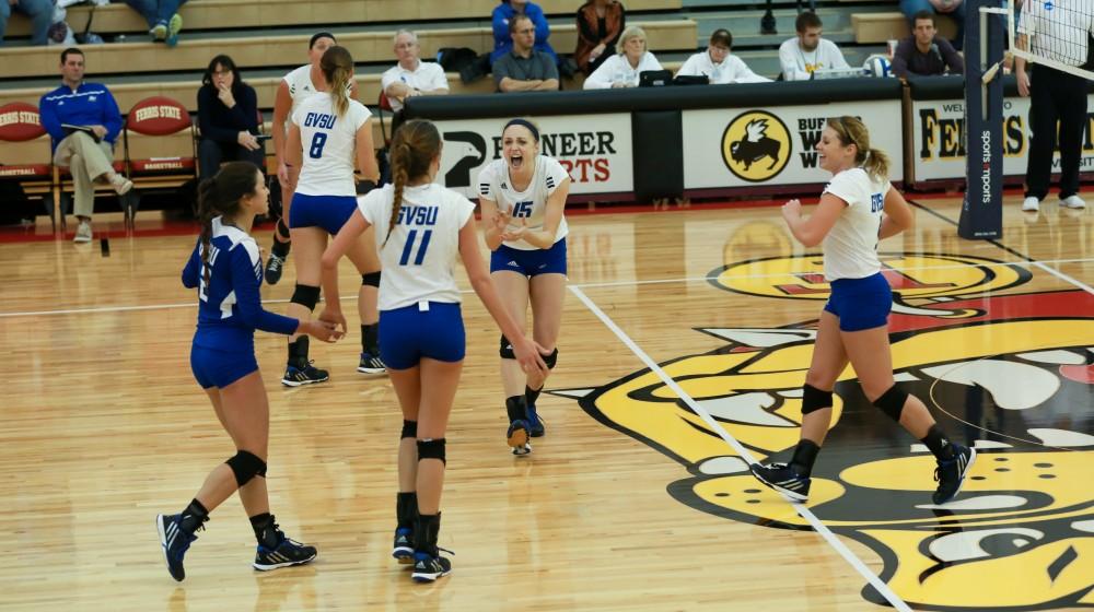 GVL / Kevin Sielaff - Kaleigh Lound (15) celebrates a point scored.  The Lakers fall to the Flyers of Lewis University Dec. 3 in Big Rapids, MI in the first round of the NCAA midwest regional tournament by a margin of 3-1.