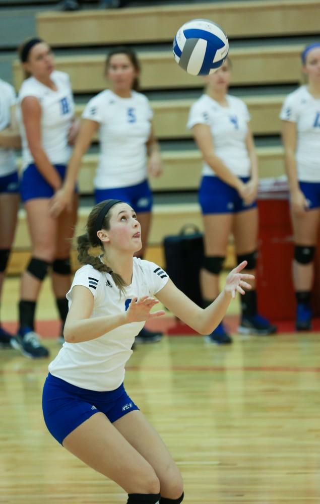 GVL / Kevin Sielaff - Betsy Ronda (6) serves the ball.  The Lakers fall to the Flyers of Lewis University Dec. 3 in Big Rapids, MI in the first round of the NCAA midwest regional tournament by a margin of 3-1.