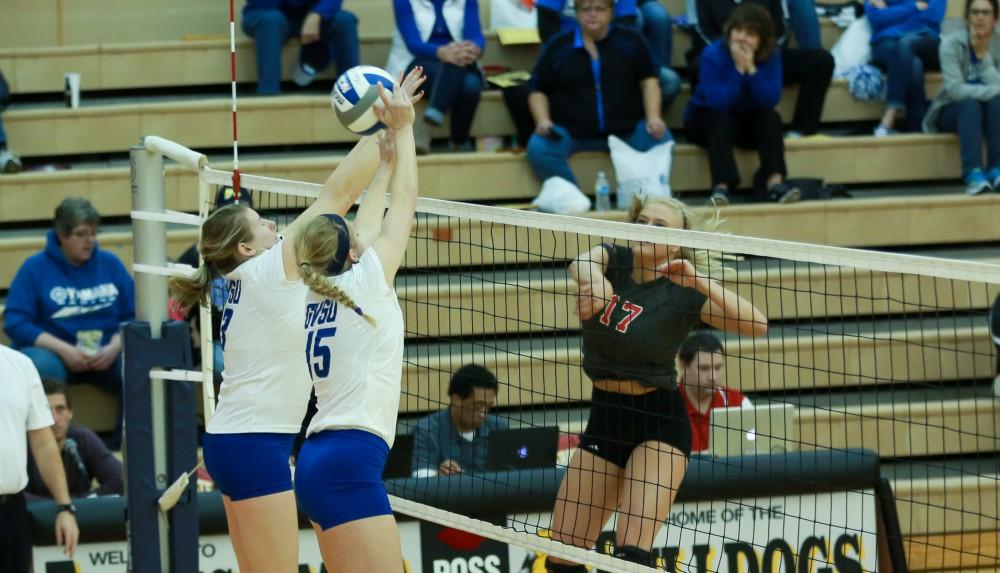 GVL / Kevin Sielaff - Kaleigh Lound (15) goes up for the block, but is met at the net.  The Lakers fall to the Flyers of Lewis University Dec. 3 in Big Rapids, MI in the first round of the NCAA midwest regional tournament by a margin of 3-1.