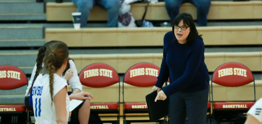 GVL / Kevin Sielaff -  Head coach Deanne Scanlon speaks to her team during a match. 