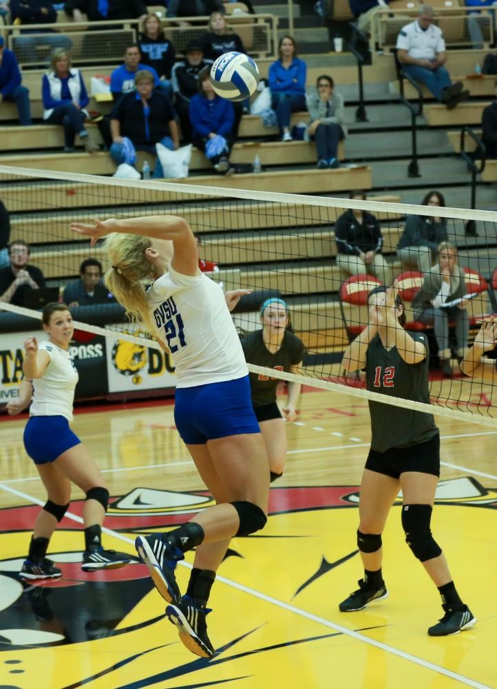 GVL / Kevin Sielaff - Staci Brower (21) looks to spike the ball.  The Lakers fall to the Flyers of Lewis University Dec. 3 in Big Rapids, MI in the first round of the NCAA midwest regional tournament by a margin of 3-1.