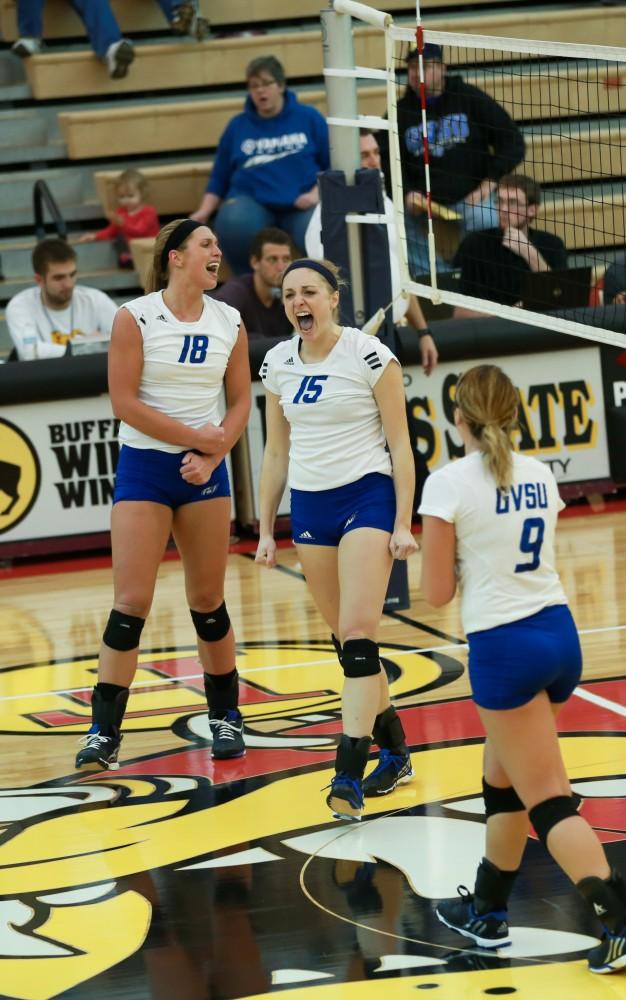 GVL / Kevin Sielaff - Kaleigh Lound (15) celebrates a point scored.  The Lakers fall to the Flyers of Lewis University Dec. 3 in Big Rapids, MI in the first round of the NCAA midwest regional tournament by a margin of 3-1.