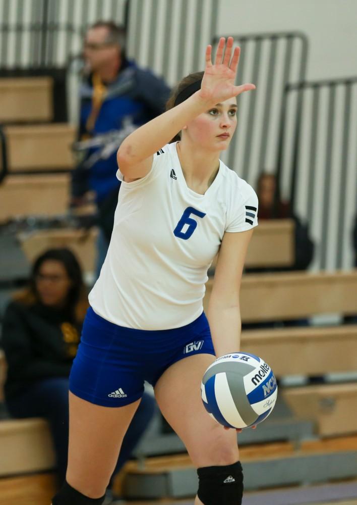 GVL / Kevin Sielaff - Betsy Ronda (6) serves the ball.  The Lakers fall to the Flyers of Lewis University Dec. 3 in Big Rapids, MI in the first round of the NCAA midwest regional tournament by a margin of 3-1.