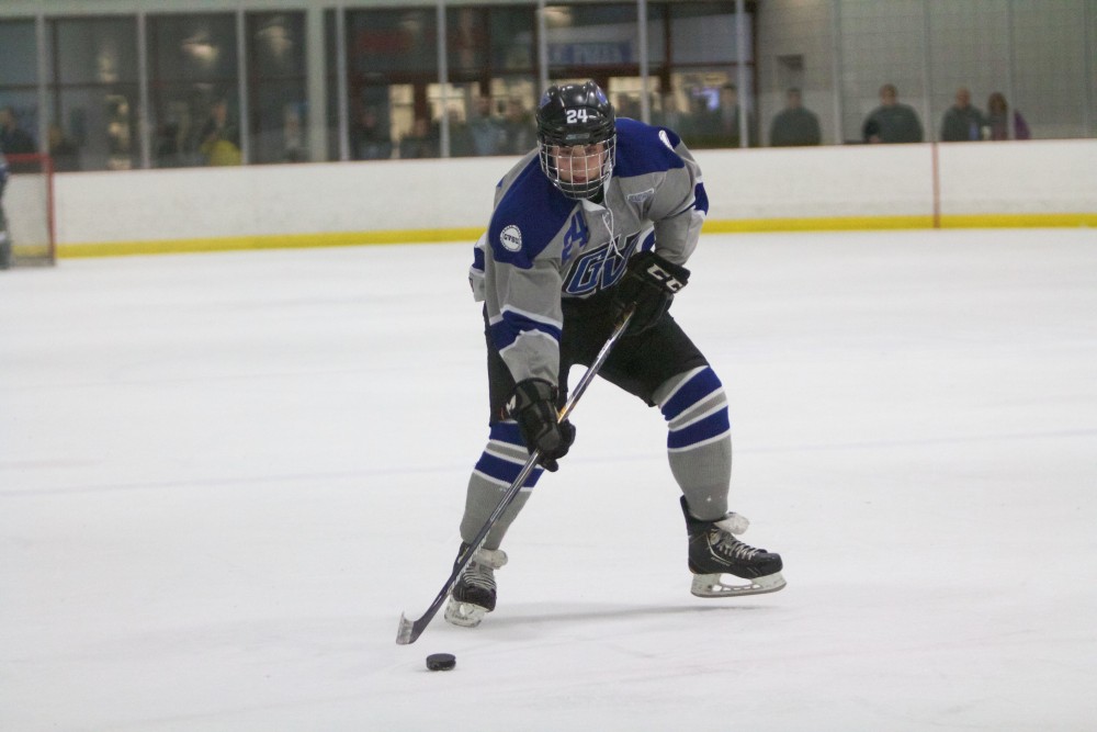 GVL / Sara Carte
Grand Valley Men’s Ice Hockey D3 player, Mitch Kahl, runs the puck down the ice against Hope College at the Georgetown Ice Arena on Jan 16.