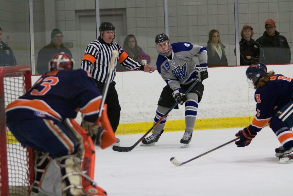 GVL / Sara Carte
Grand Valley Men’s Ice Hockey D3 player, Blaine Marney, looks to score against Hope College at the Georgetown Ice Arena on Jan 16.