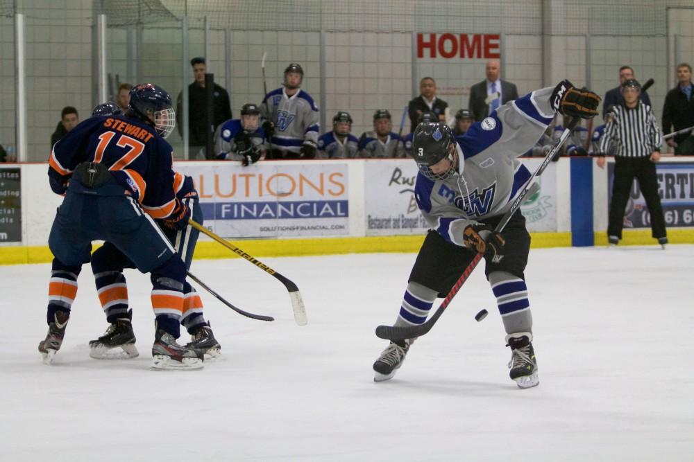 GVL / Sara Carte
Grand Valley Men’s Ice Hockey D3 player, Danny Smith, looks to pass against Hope College at the Georgetown Ice Arena on Jan 16.