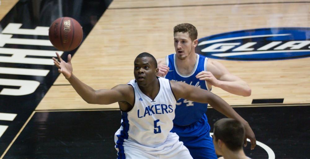 GVL / Kevin Sielaff - Trevin Alexander (5) receives a pass in the paint.  The Lakers defeat the Chargers of Hillsdale College Saturday, Jan. 30, 2016 in Allendale.