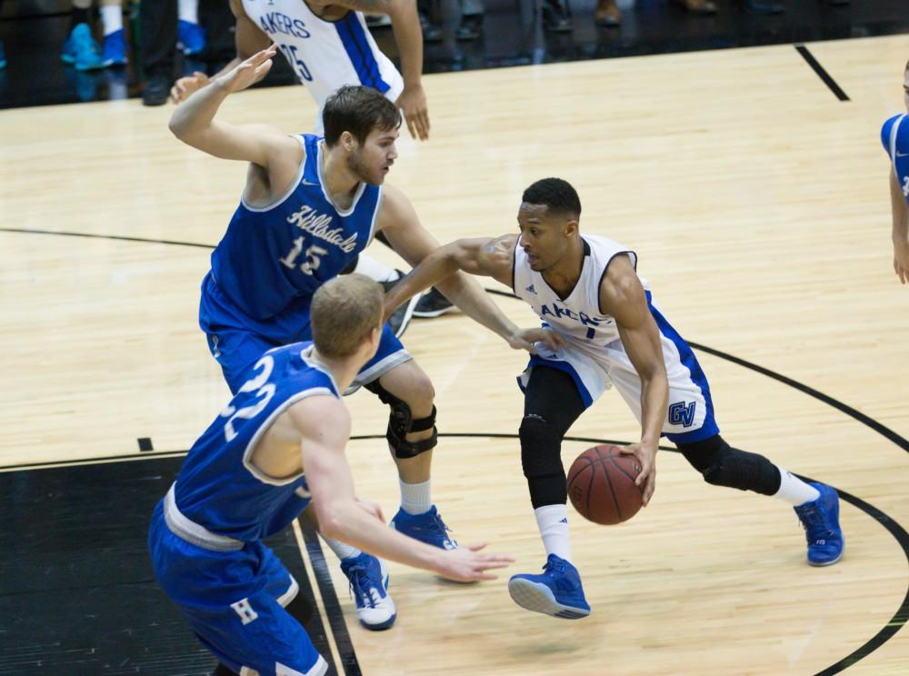 GVL / Kevin Sielaff - Aaron Hayes (1) drives the ball to the net.  The Lakers defeat the Chargers of Hillsdale College Saturday, Jan. 30, 2016 in Allendale.