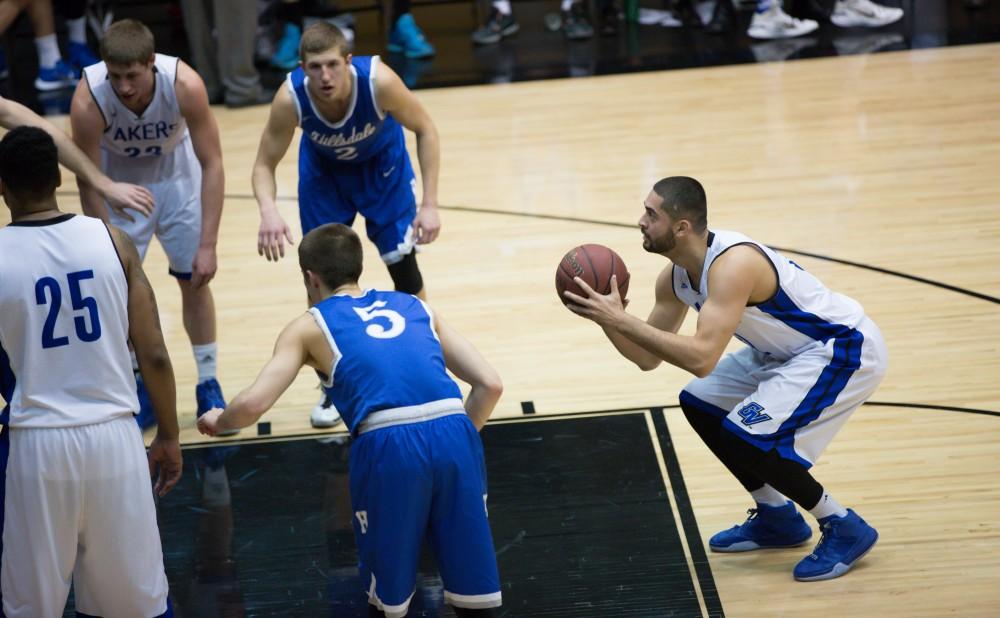 GVL / Kevin Sielaff - Ricardo Carbajal (32) pulls up for a free throw attempt.  The Lakers defeat the Chargers of Hillsdale College Saturday, Jan. 30, 2016 in Allendale.