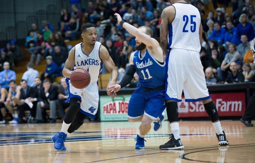 GVL / Kevin Sielaff - Aaron Hayes (1) drives toward the basket.  The Lakers defeat the Chargers of Hillsdale College Saturday, Jan. 30, 2016 in Allendale.