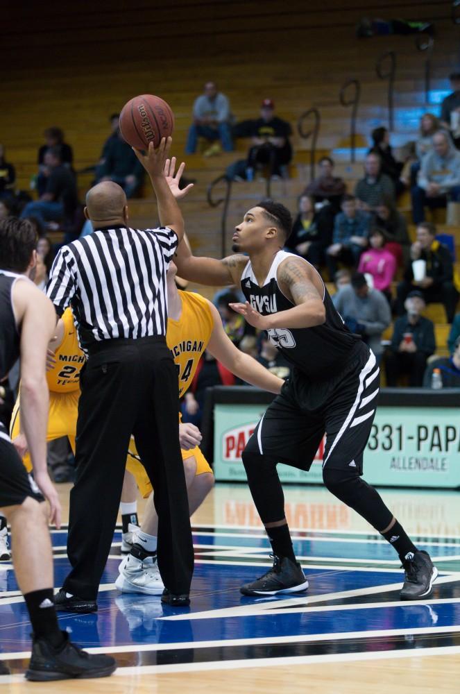 GVL / Kevin Sielaff - Chaz Rollins (25) prepares for the jump ball.  The Lakers defeat the Huskies of Michigan Tech with a final score of 64-53 Jan. 17, 2016 in Allendale.