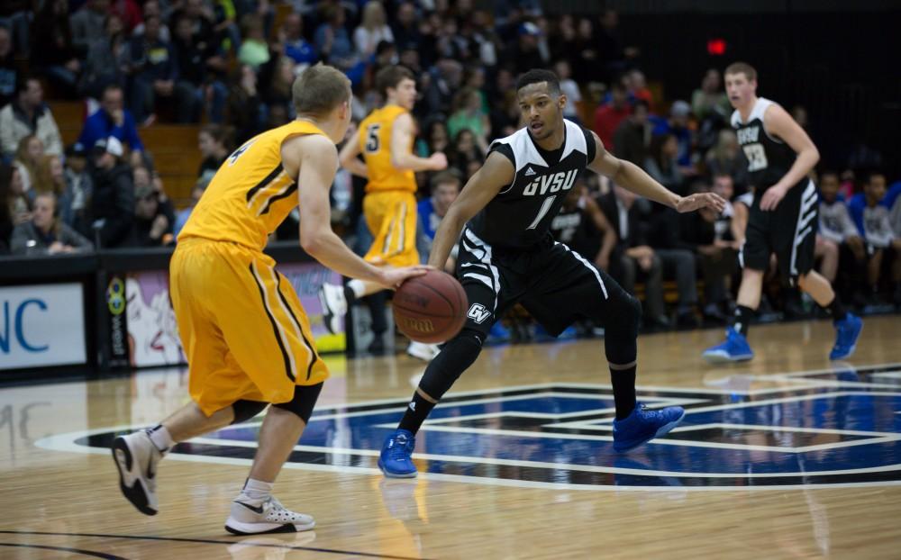 GVL / Kevin Sielaff - Aaron Hayes (1) back peddles as he defends a Huskie attack.  The Lakers defeat the Huskies of Michigan Tech with a final score of 64-53 Jan. 17, 2016 in Allendale.