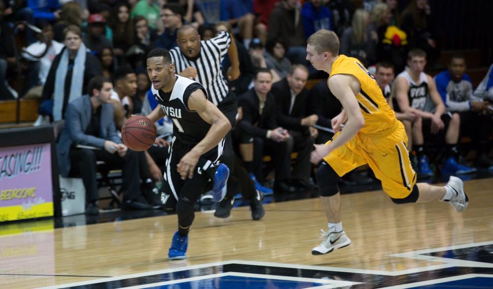 GVL / Kevin Sielaff - Aaron Hayes (1) drives the ball hard down court.  The Lakers defeat the Huskies of Michigan Tech with a final score of 64-53 Jan. 17, 2016 in Allendale.