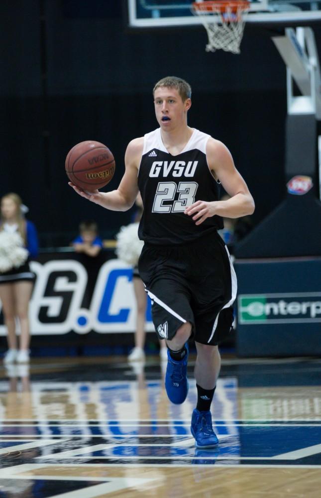 GVL / Kevin Sielaff - Luke Ryskamp (23) takes an inbound pass and dribbles the ball up court.  The Lakers defeat the Huskies of Michigan Tech with a final score of 64-53 Jan. 17, 2016 in Allendale.