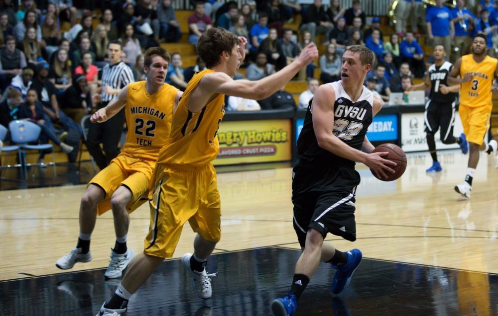 GVL / Kevin Sielaff - Luke Ryskamp (23) drives hard on net and pulls up for a layup.  The Lakers defeat the Huskies of Michigan Tech with a final score of 64-53 Jan. 17, 2016 in Allendale.