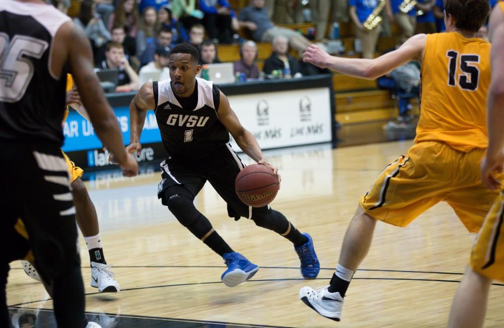 GVL / Kevin Sielaff - Aaron Hayes (1) drives down the paint as he goes in for a layup.  The Lakers defeat the Huskies of Michigan Tech with a final score of 64-53 Jan. 17, 2016 in Allendale.