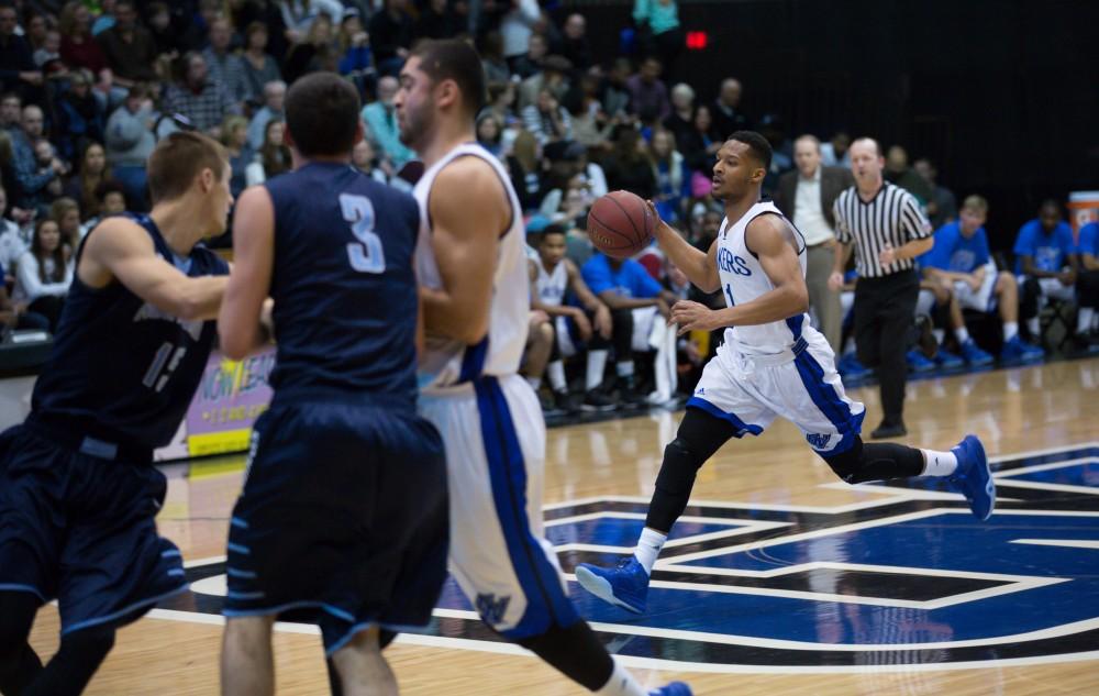 GVL / Kevin Sielaff - Aaron Hayes (1) drives the ball up the court.  The Lakers defeat the Timberwolves of Northwood University with a final score of 66-53 Jan. 24, 2016 in Allendale.