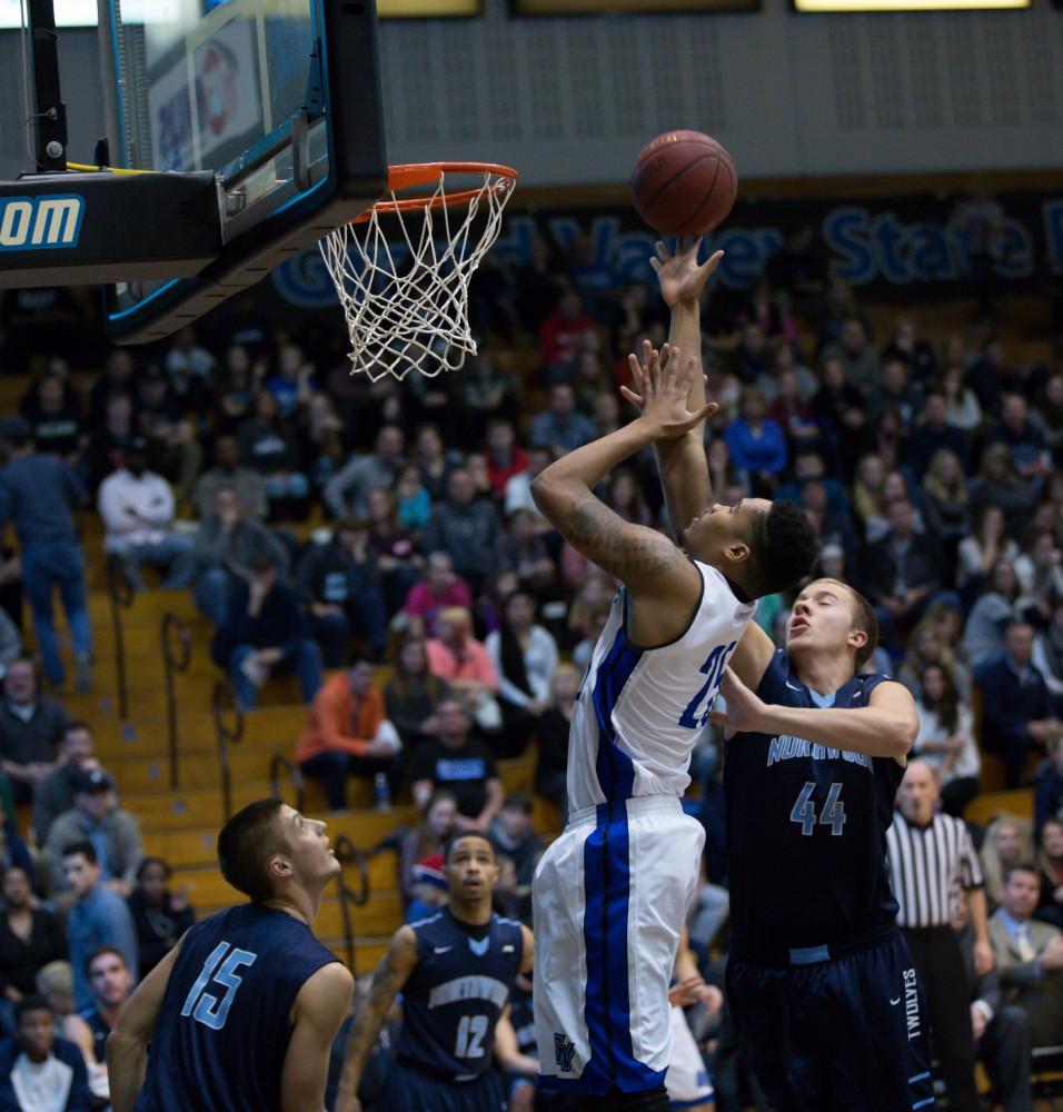 GVL / Kevin Sielaff - Chaz Rollins (25) goes up to grab a rebound.  The Lakers defeat the Timberwolves of Northwood University with a final score of 66-53 Jan. 24, 2016 in Allendale.