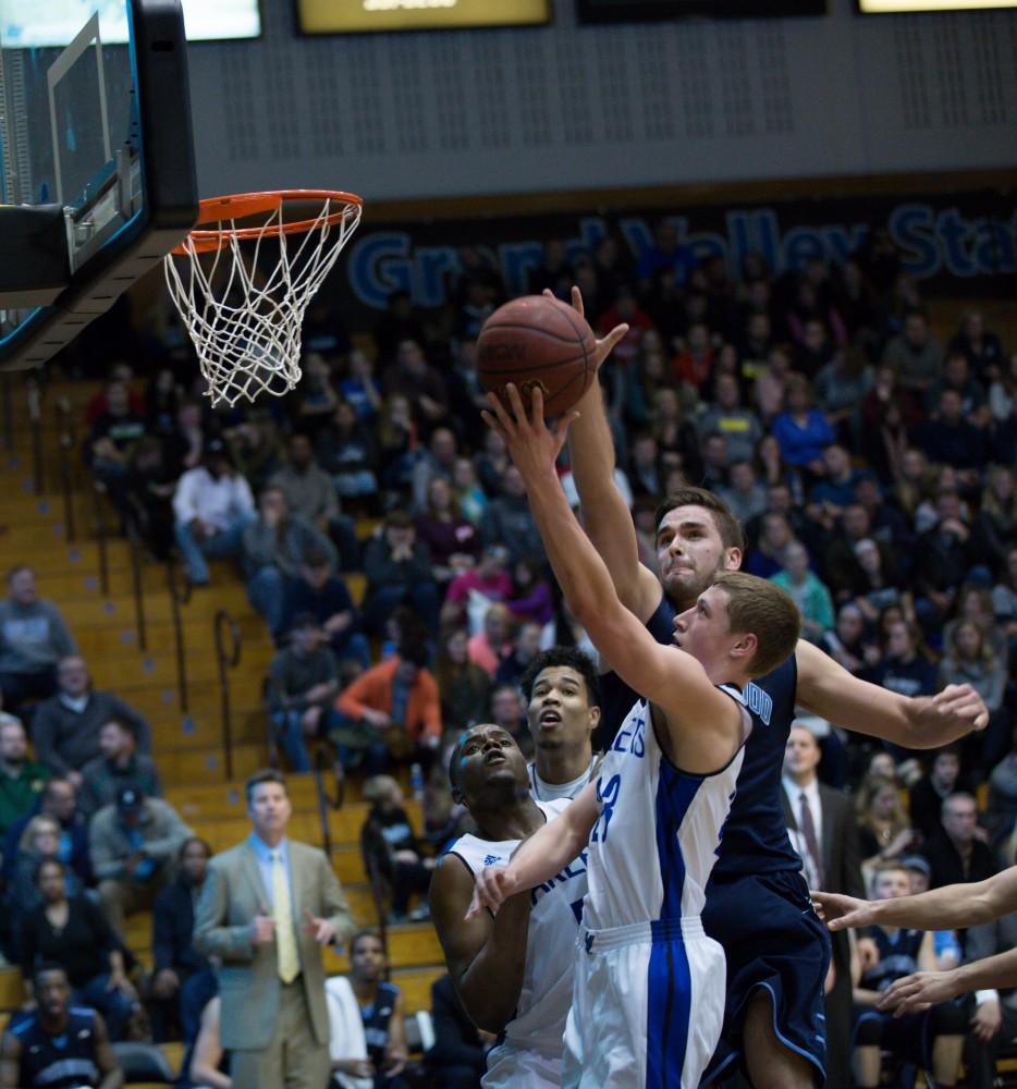 GVL / Kevin Sielaff - Luke Ryskamp (23) goes up for a lay-up.  The Lakers defeat the Timberwolves of Northwood University with a final score of 66-53 Jan. 24, 2016 in Allendale.