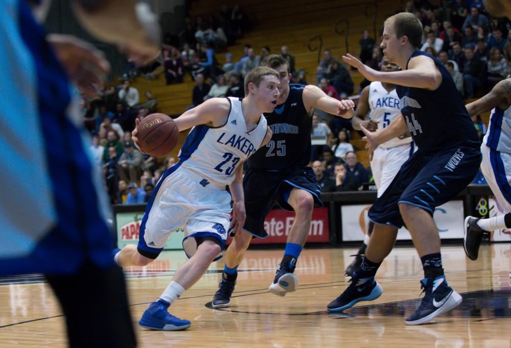 GVL / Kevin Sielaff - Luke Ryskamp (23) drives to the hoop.  The Lakers defeat the Timberwolves of Northwood University with a final score of 66-53 Jan. 24, 2016 in Allendale.