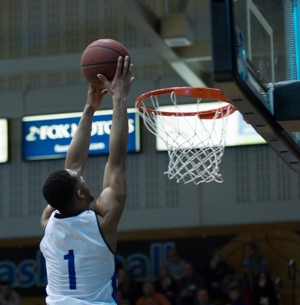 GVL / Kevin Sielaff - Aaron Hayes (1) goes up for a dunk in the second quarter.  The Lakers defeat the Timberwolves of Northwood University with a final score of 66-53 Jan. 24, 2016 in Allendale.