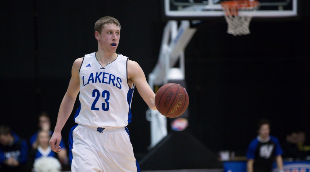 GVL / Kevin Sielaff - Luke Ryskamp (23) dribbles the ball up the court.  The Lakers defeat the Timberwolves of Northwood University with a final score of 66-53 Jan. 24, 2016 in Allendale.